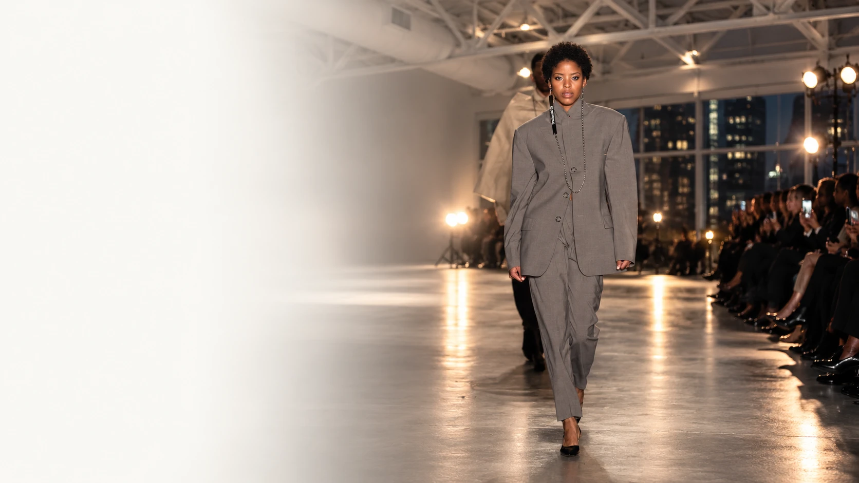 Gray tailoring on the runway from the AVORÉ cinematic pitch